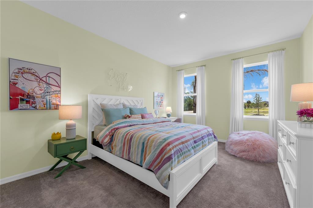 933 Pearlwood Loop Bartow, FL 33830 - Photo 23 of 39 a bedroom with a bed and window