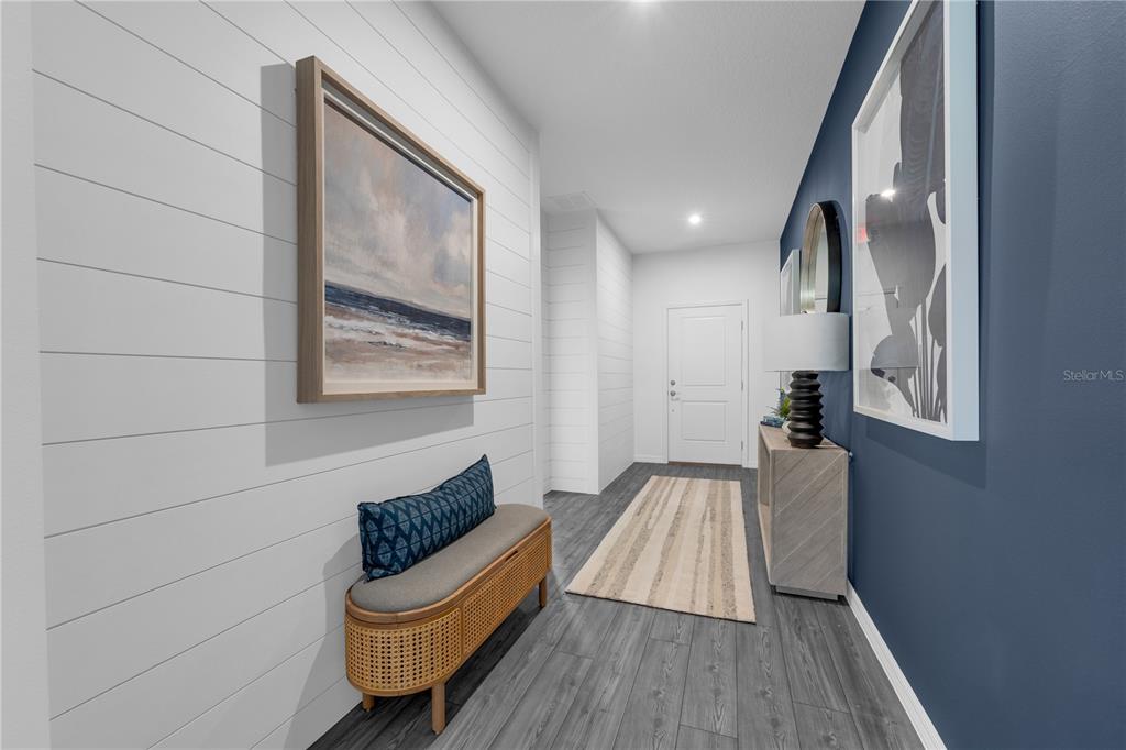 933 Pearlwood Loop Bartow, FL 33830 - Photo 3 of 39 a living room with furniture and a wooden floor