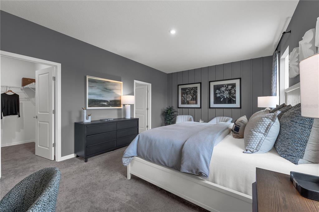 933 Pearlwood Loop Bartow, FL 33830 - Photo 35 of 39 a bedroom with a bed and a dresser