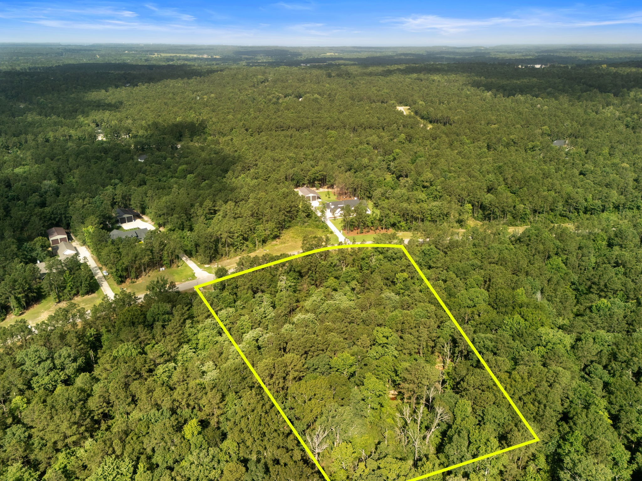10751 Ruger Road Willis, TX 77378 - Photo 4 of 22 Tucked just inside the front of Republic Grand Ranch in Section 3, this scenic 3-acre parcel offers a private slice of Texas forest.