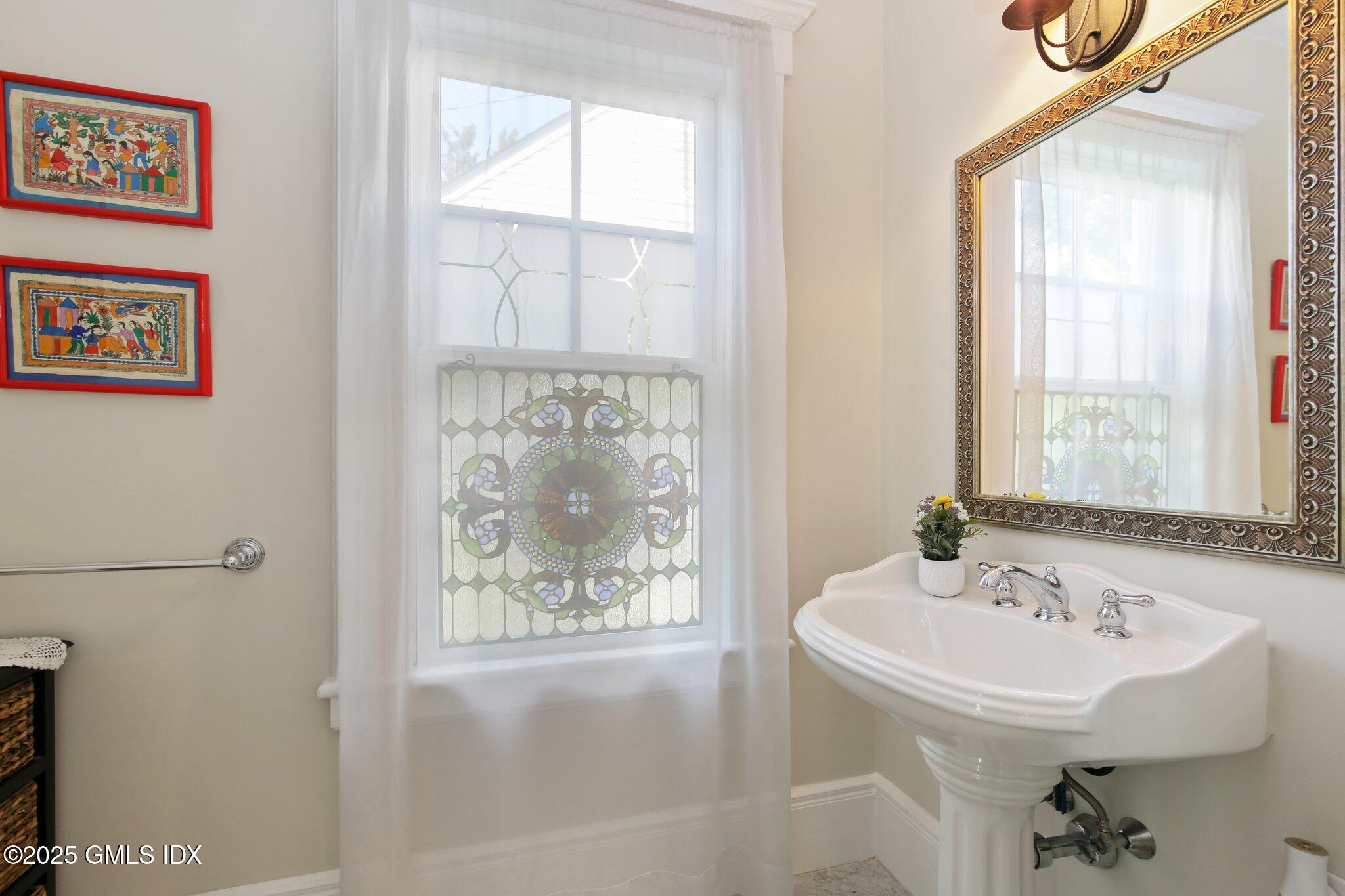 23 Westview Place Riverside, CT 06878 - Photo 19 of 42 a bathroom with a sink and a window