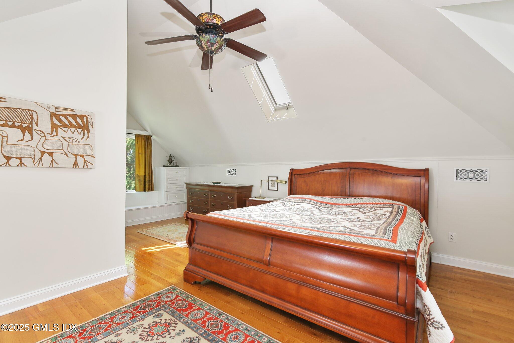 23 Westview Place Riverside, CT 06878 - Photo 20 of 42 a bedroom with a bed and a dresser