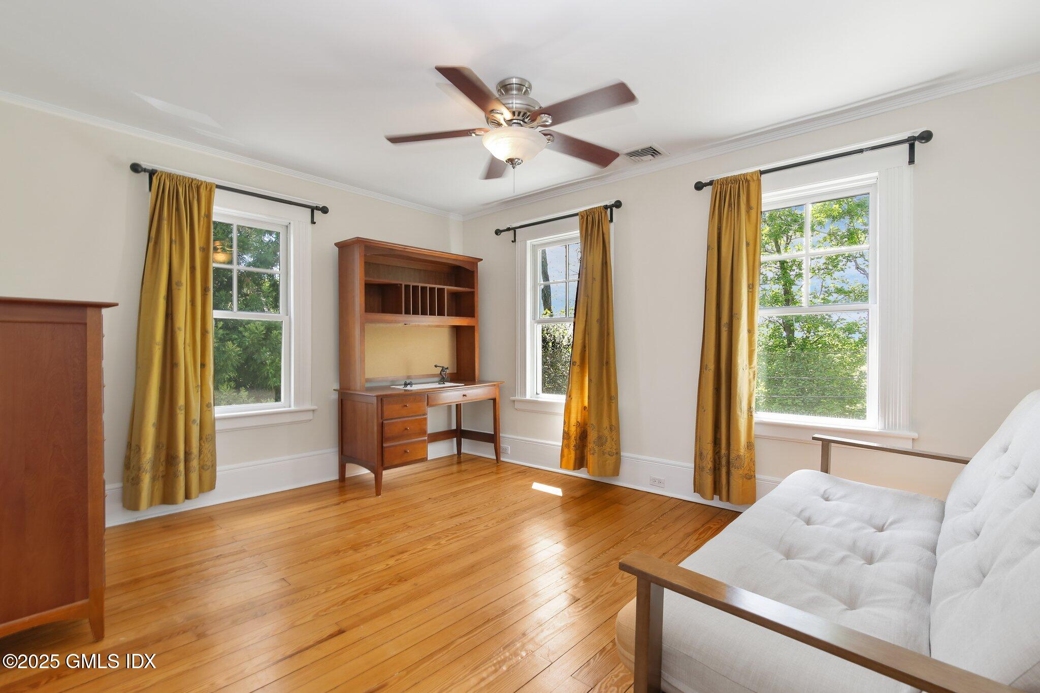 23 Westview Place Riverside, CT 06878 - Photo 24 of 42 a living room with furniture and a large window