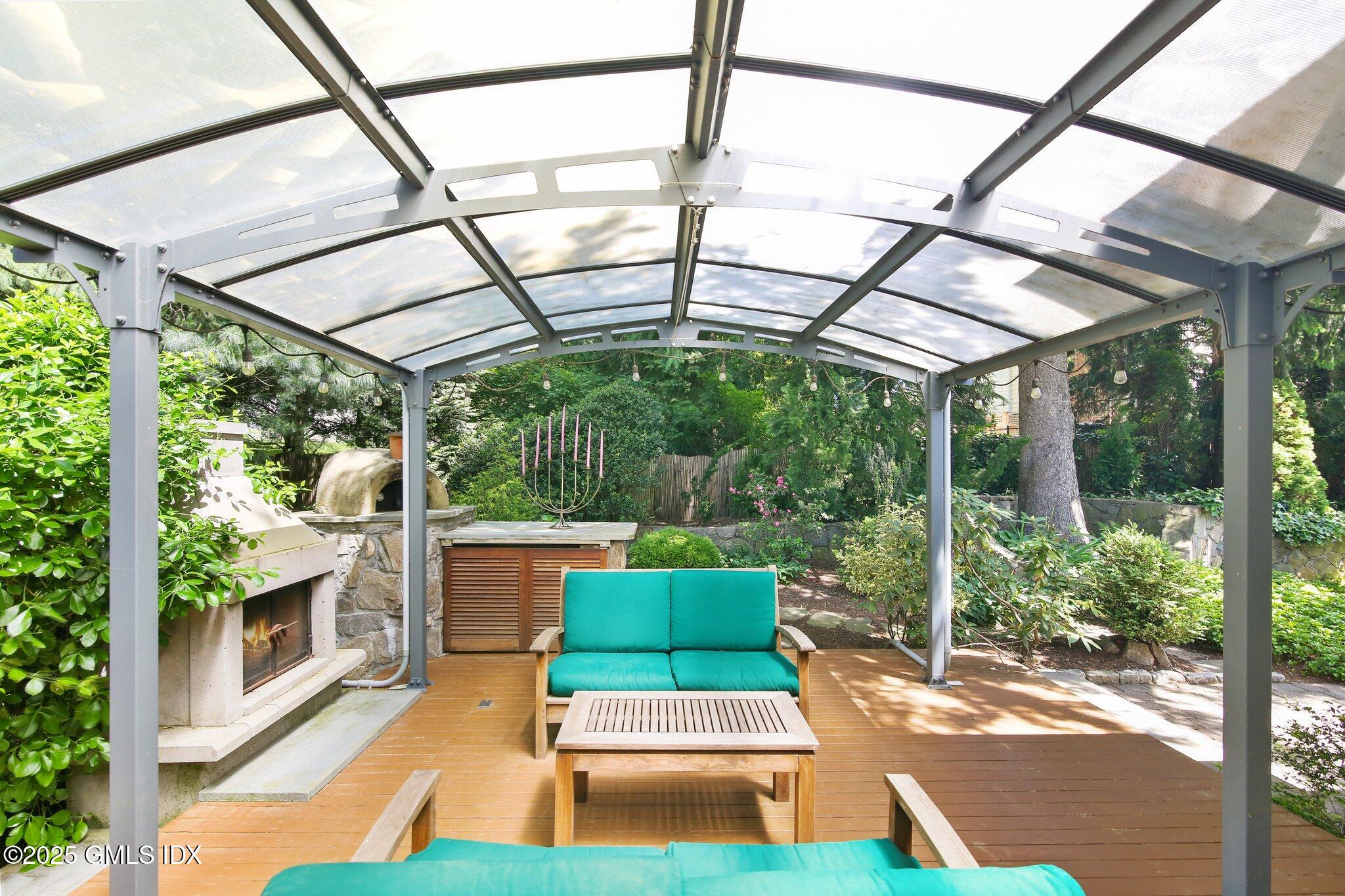 23 Westview Place Riverside, CT 06878 - Photo 31 of 42 a view of a patio with a table and chairs