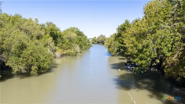 a bathroom with a shower and a door