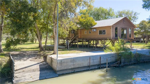 swimming pool view with a seating space