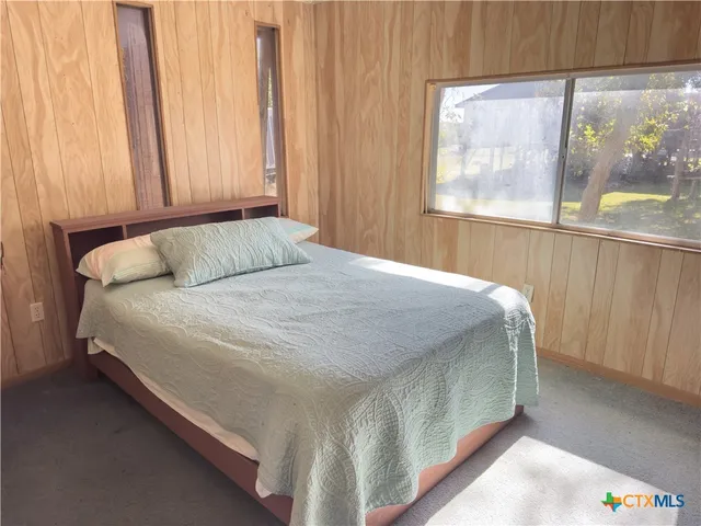 a view of balcony with wooden floor