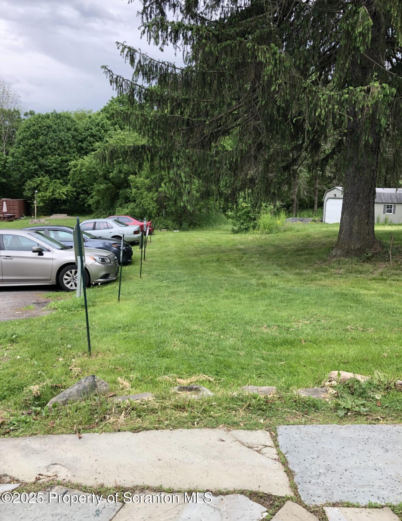 134 Market Street Moscow, PA 18444 - Photo 9 of 11 a backyard of a house with table and chairs