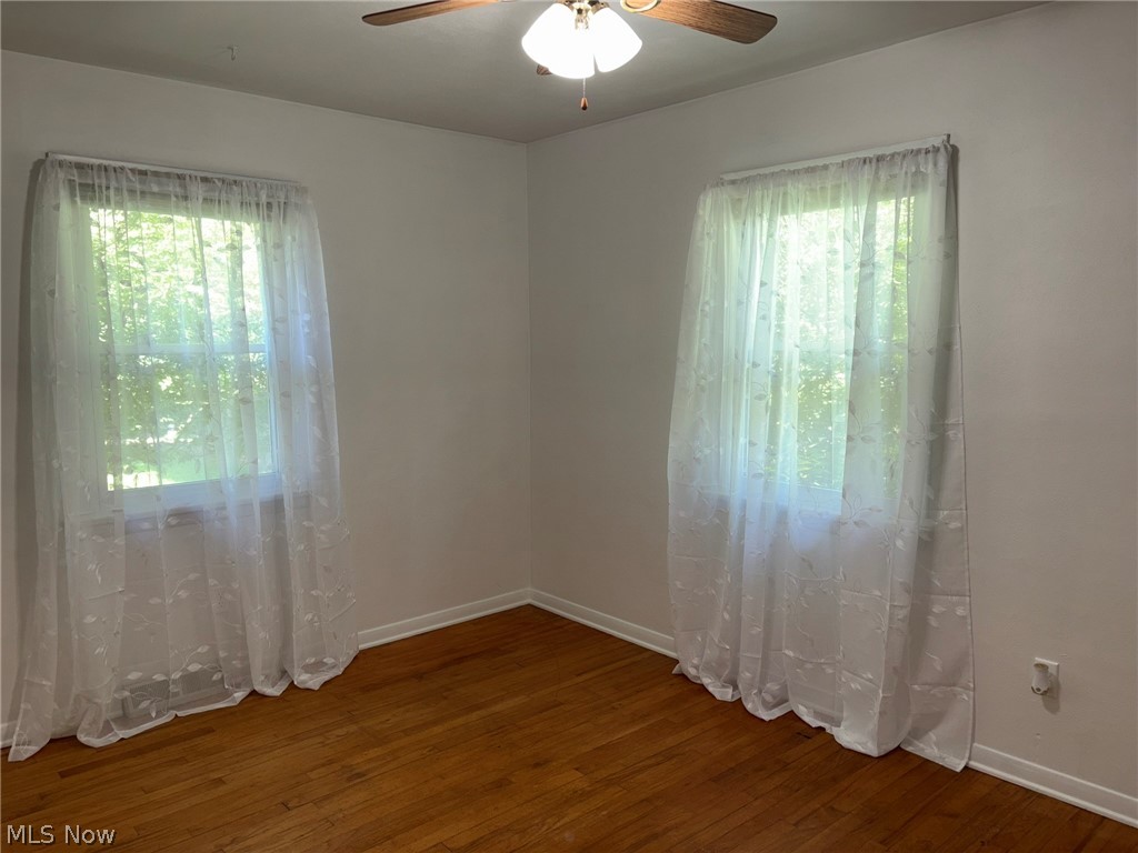 2140 Claus Road Vermilion, OH 44089 - Photo 16 of 50 Bedroom with hardwood floors