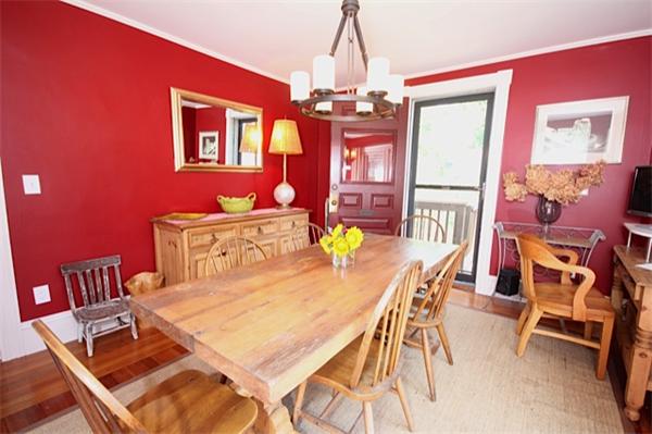48 Banks Road Swampscott, MA 01907 - Photo 16 of 28 a view of a dining room with furniture and chandelier