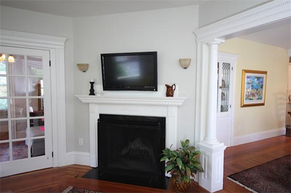 48 Banks Road Swampscott, MA 01907 - Photo 8 of 28 a living room with furniture and a fireplace