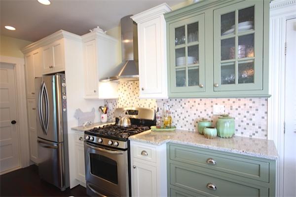 48 Banks Road Swampscott, MA 01907 - Photo 10 of 28 a kitchen with stainless steel appliances a stove a refrigerator and cabinets