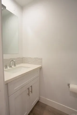a bathroom with a sink and a vanity