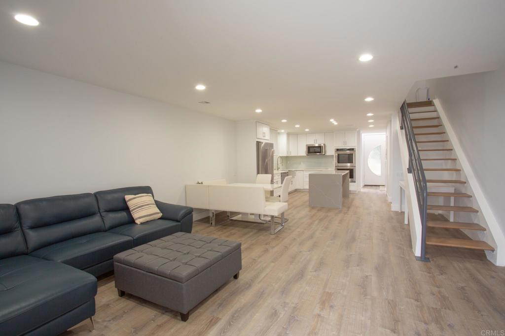 922 Sealane Drive, Unit B Encinitas, CA 92024 - Photo 9 of 30 a living room with furniture and wooden floor