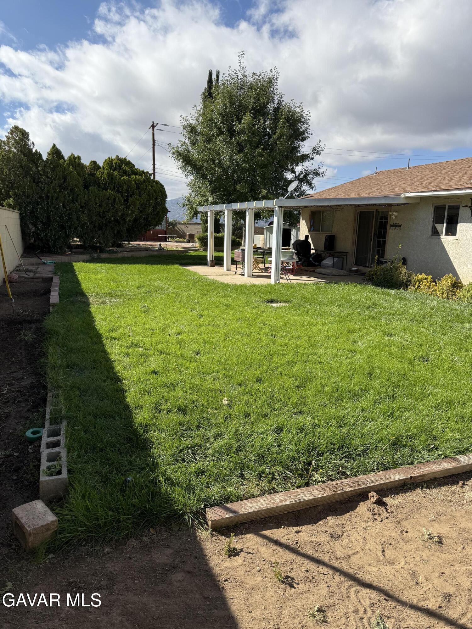919 Golden W Court Tehachapi, CA 93561 - Photo 20 of 23 a view of a house with backyard