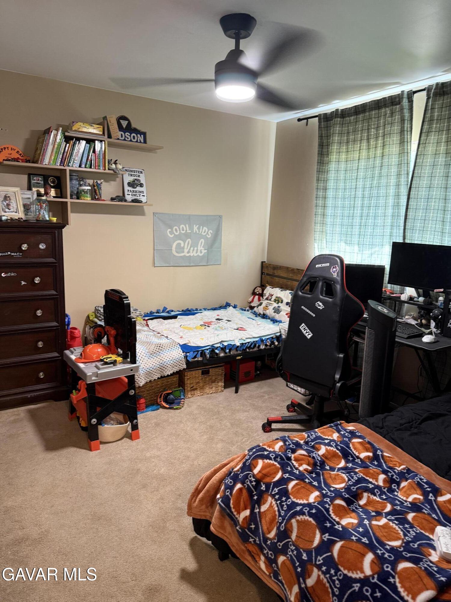 919 Golden W Court Tehachapi, CA 93561 - Photo 4 of 23 a bedroom with two beds and a window