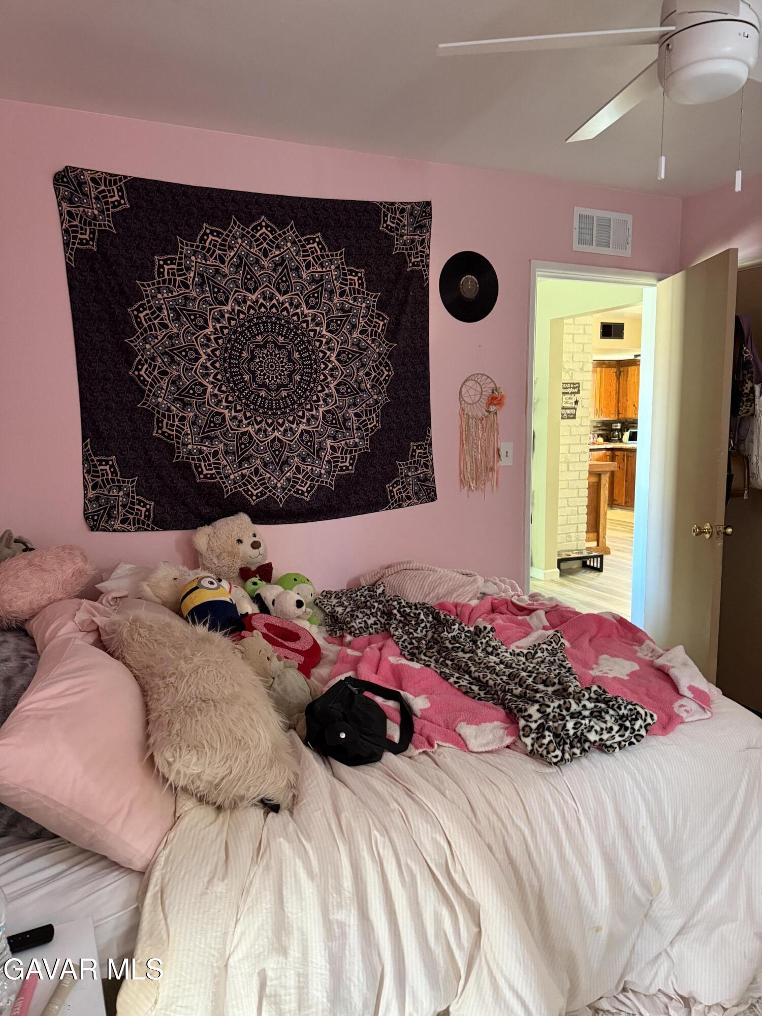 919 Golden W Court Tehachapi, CA 93561 - Photo 9 of 23 a bedroom with a bed and a window