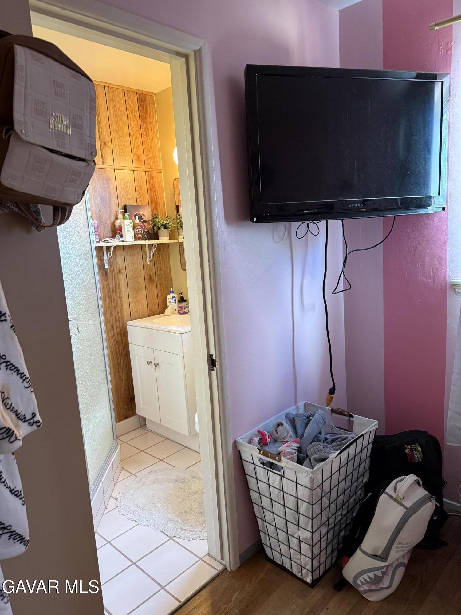 919 Golden W Court Tehachapi, CA 93561 - Photo 10 of 23 a living room with furniture and a flat screen tv