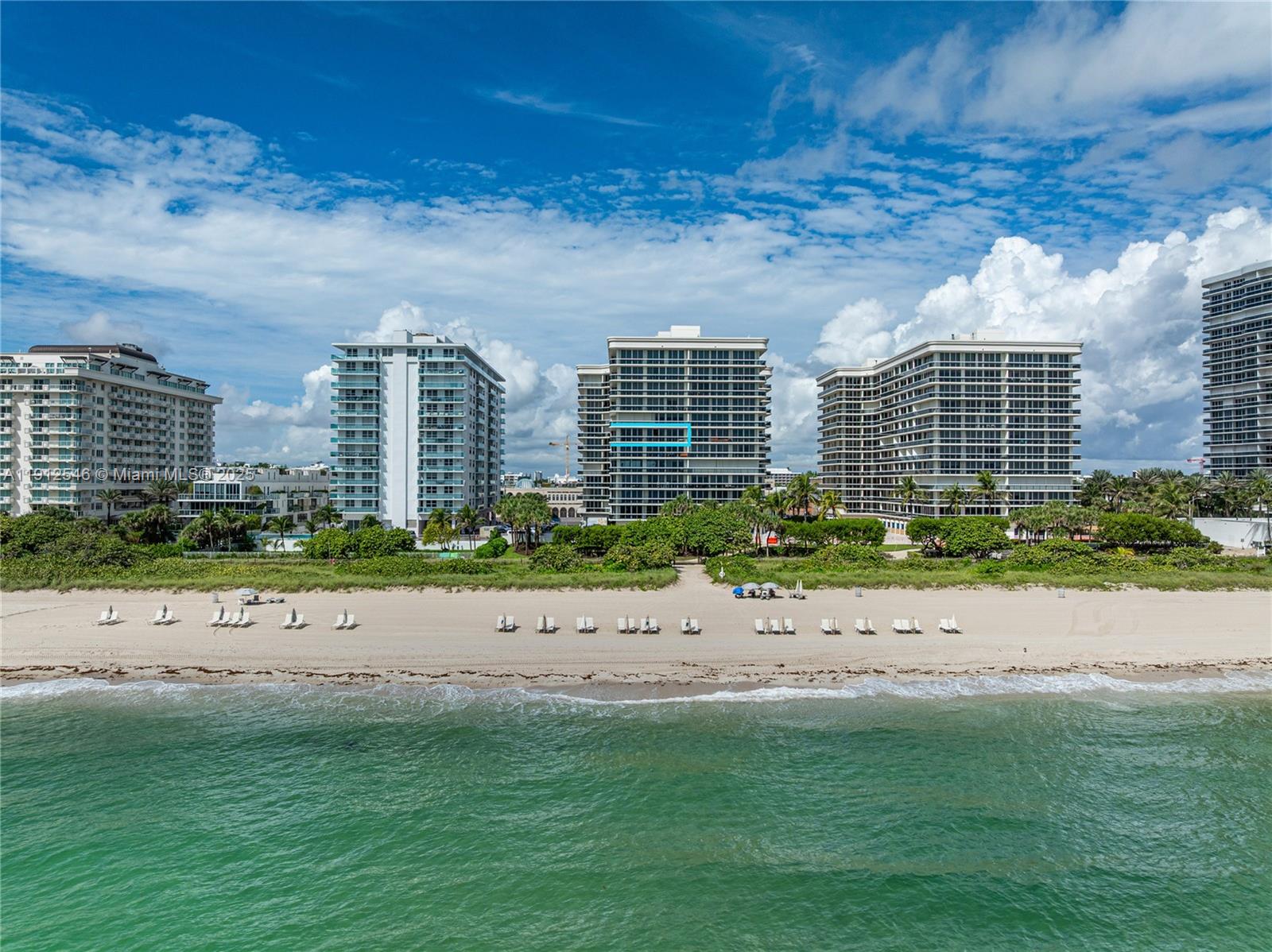9559 Collins Avenue, Unit S7A Surfside, FL 33154 - Photo 1 of 43 a view of a beach with a yard