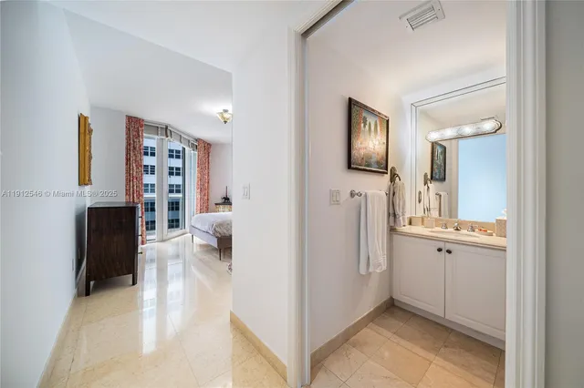 a view of a balcony with a door and an outdoor space