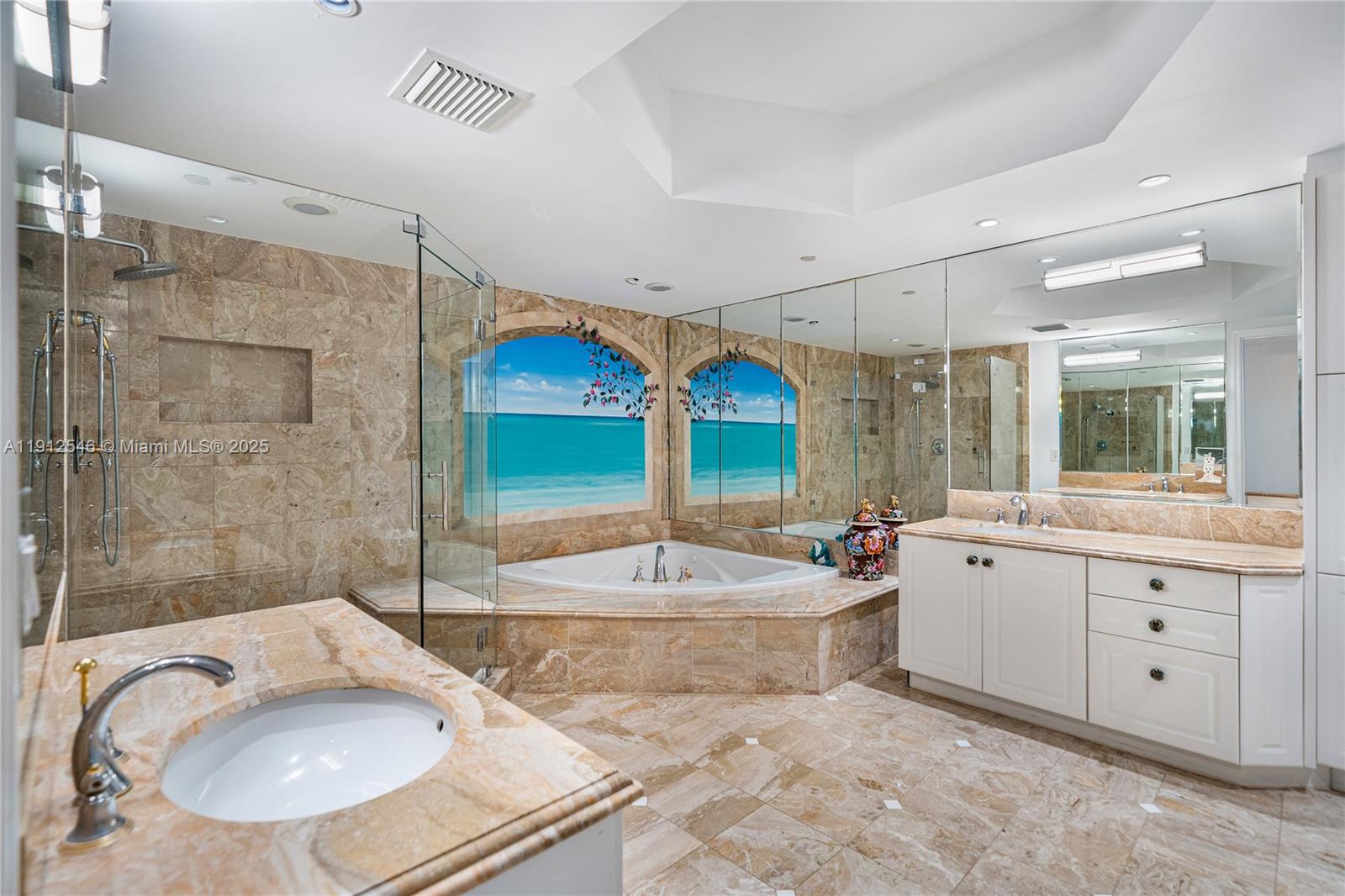 9559 Collins Avenue, Unit S7A Surfside, FL 33154 - Photo 22 of 43 a spacious bathroom with a tub sink mirror and shower