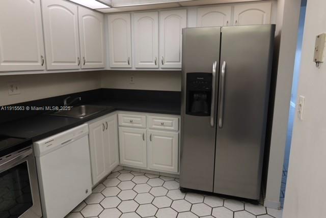 Inverrary Lauderhill, FL 33319 - Photo 3 of 15 a kitchen with stainless steel appliances granite countertop a refrigerator a stove and a sink