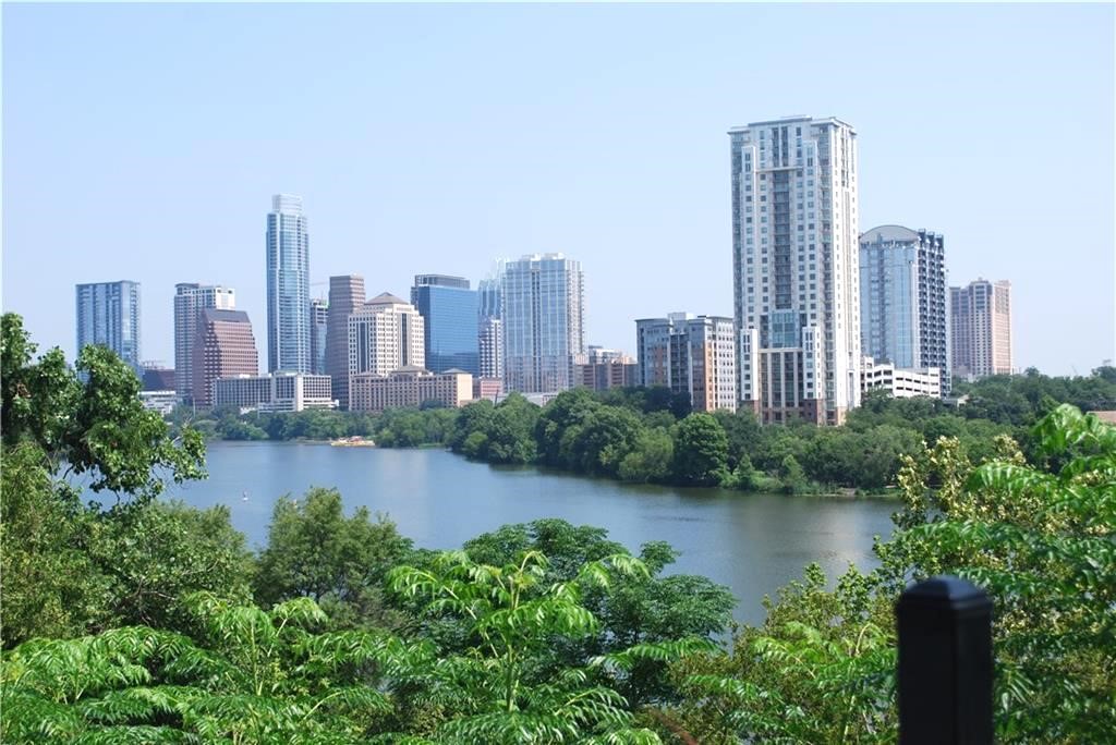808 Edgecliff Terrace, Unit A Austin, TX 78704 - Photo 11 of 11 a view of a city with tall buildings next to a lake