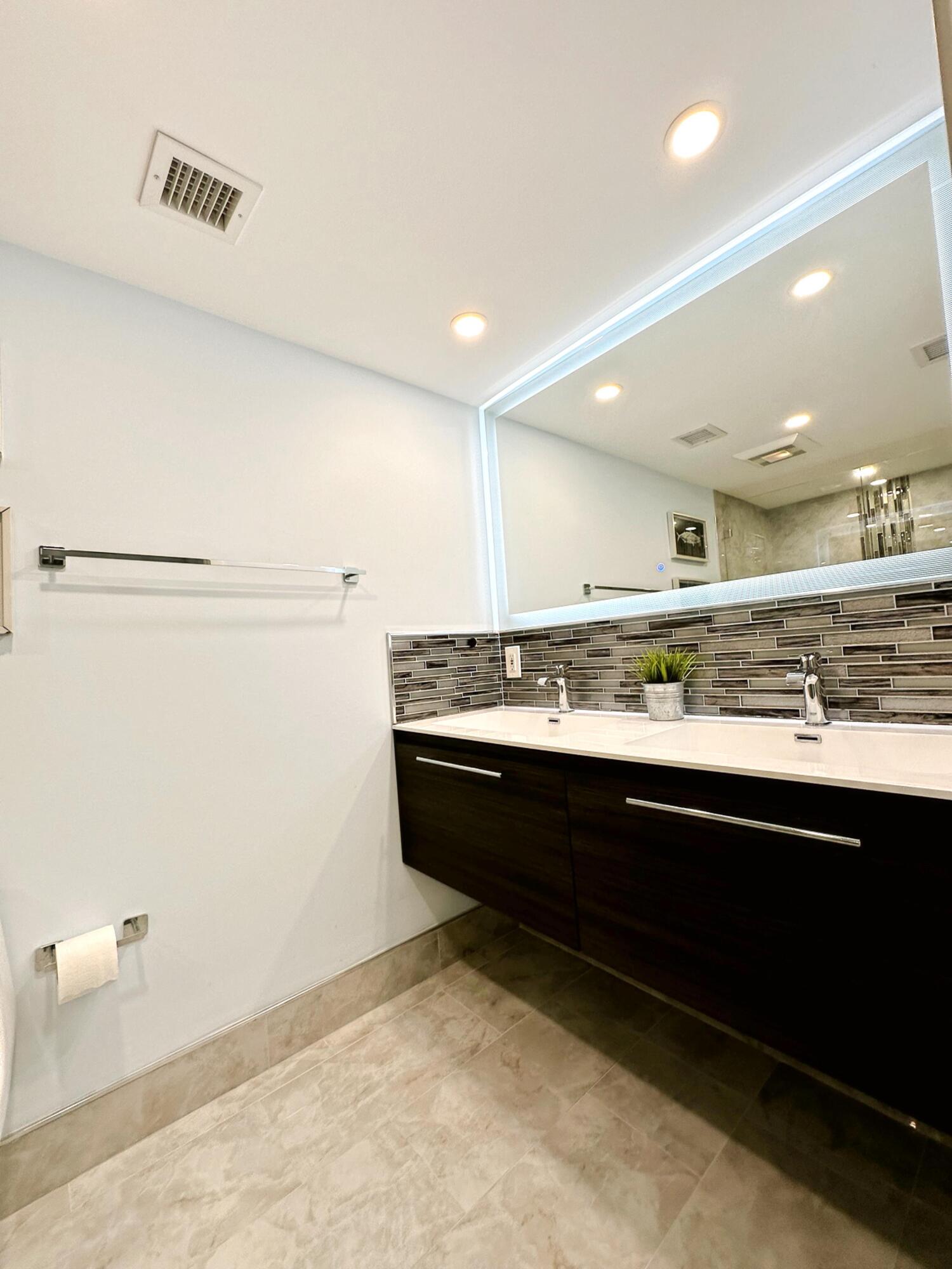 3594 South Ocean Boulevard, Unit 206 Highland Beach, FL 33487 - Photo 12 of 21 a view of kitchen with stainless steel appliances granite countertop cabinets and sink