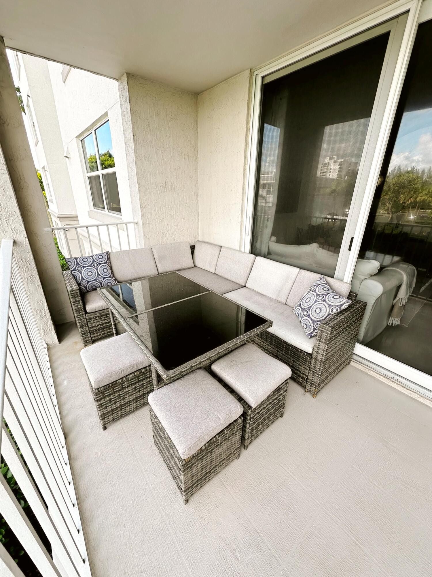 3594 South Ocean Boulevard, Unit 206 Highland Beach, FL 33487 - Photo 8 of 21 a living room with furniture and a window
