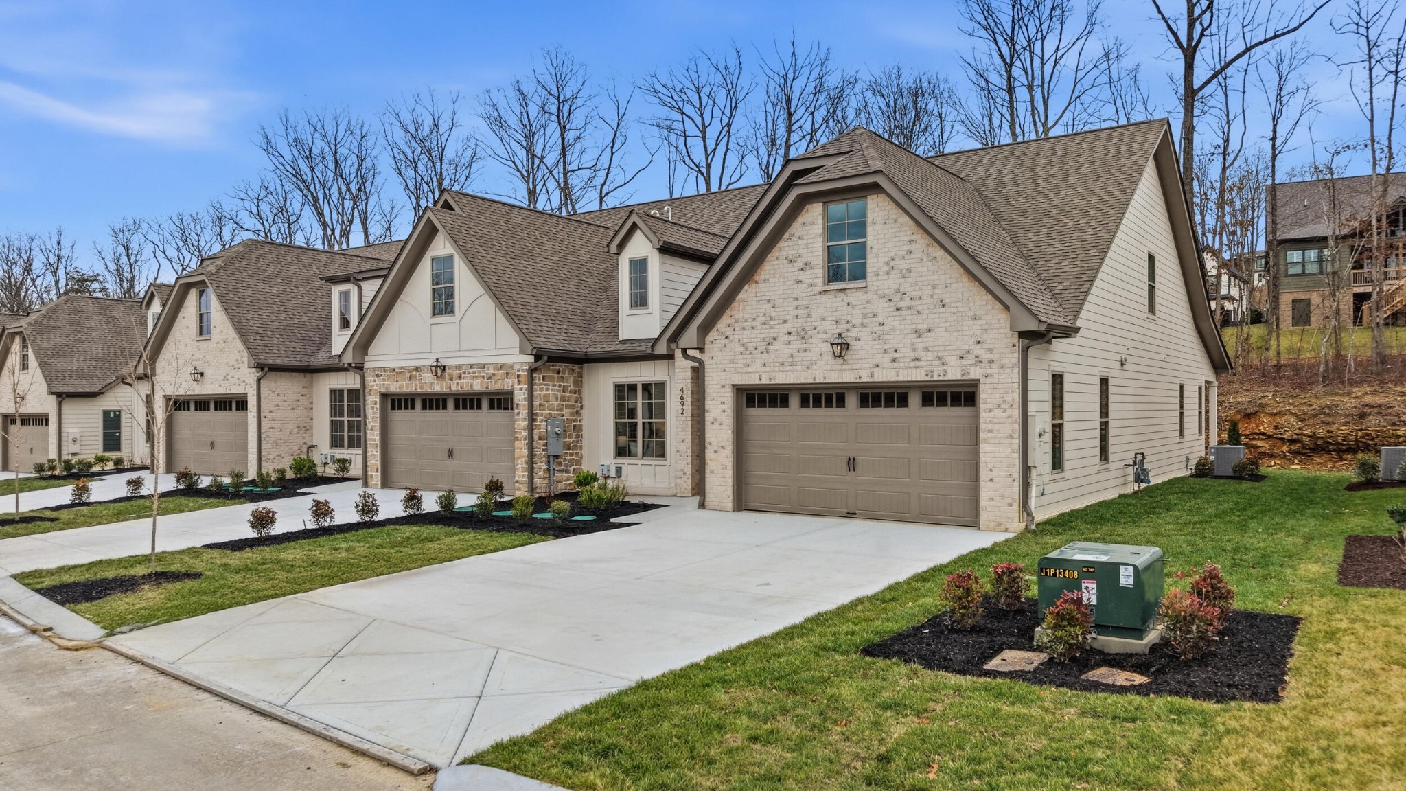 4692 Dempsey Way Chattanooga, TN 37419 - Photo 2 of 37 a front view of a house with a yard