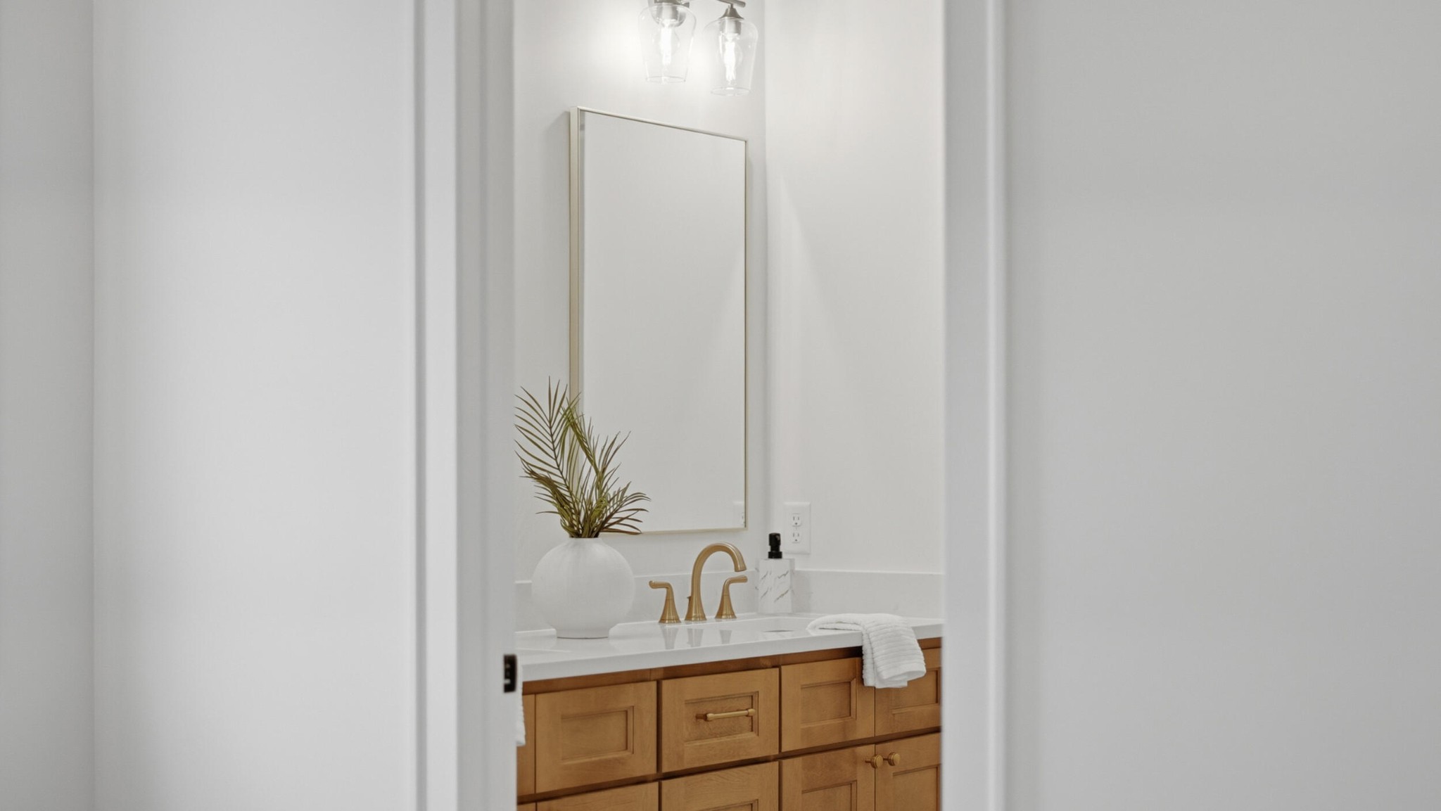 4692 Dempsey Way Chattanooga, TN 37419 - Photo 24 of 37 a bathroom with a sink and a mirror