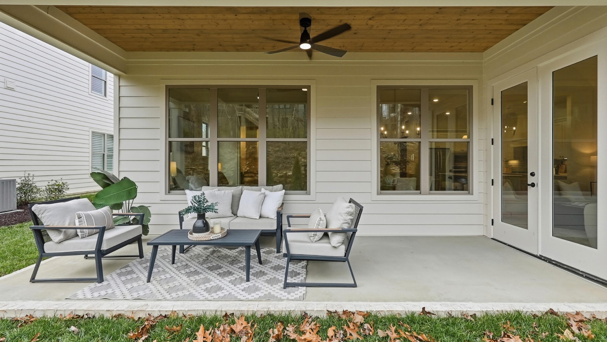 4692 Dempsey Way Chattanooga, TN 37419 - Photo 34 of 37 a roof deck with table and chairs and potted plants