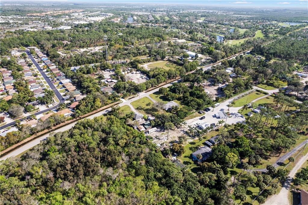 851 Barefoot Williams Road Naples, FL 34113 - Photo 27 of 35 an aerial view of a city