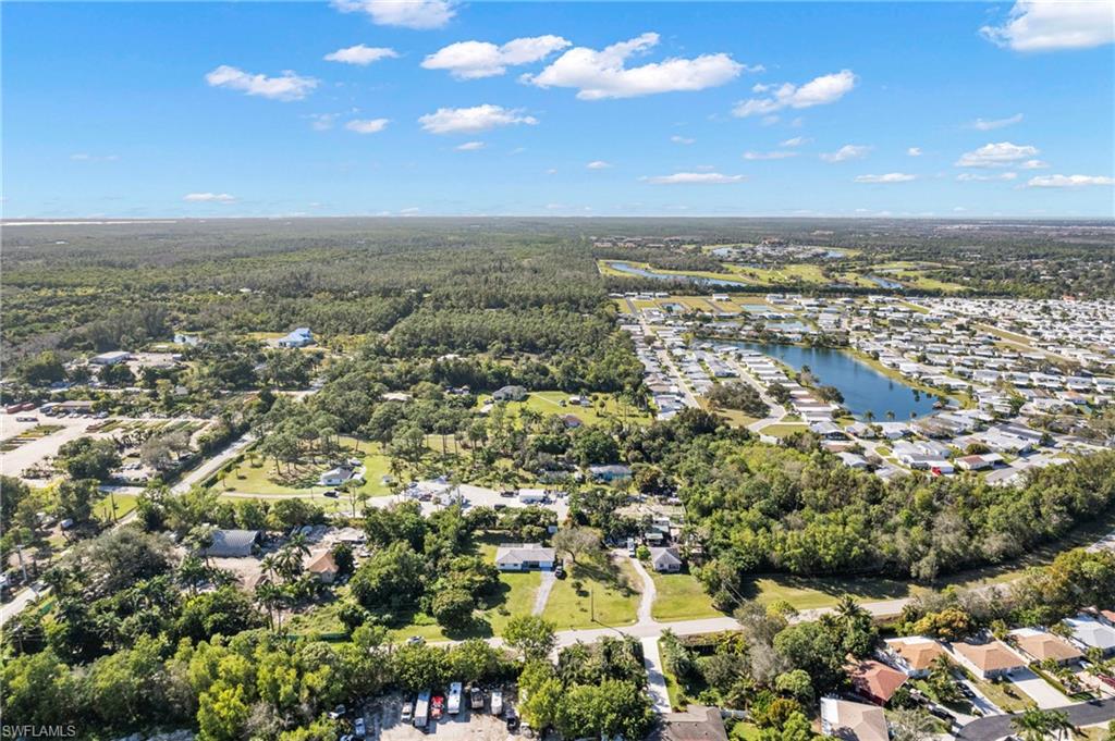 851 Barefoot Williams Road Naples, FL 34113 - Photo 28 of 35 an aerial view of a city