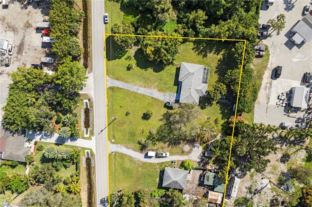 851 Barefoot Williams Road Naples, FL 34113 - Photo 32 of 35 an aerial view of residential houses with outdoor space