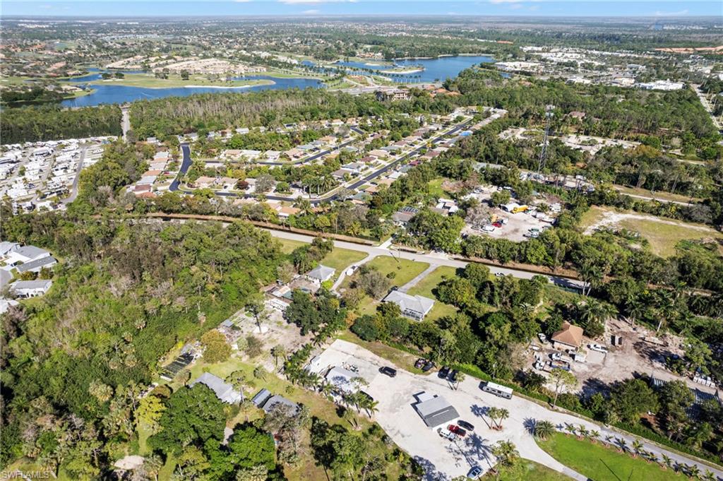 851 Barefoot Williams Road Naples, FL 34113 - Photo 33 of 35 an aerial view of residential houses with outdoor space