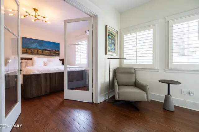 a view of a patio with a table and chairs