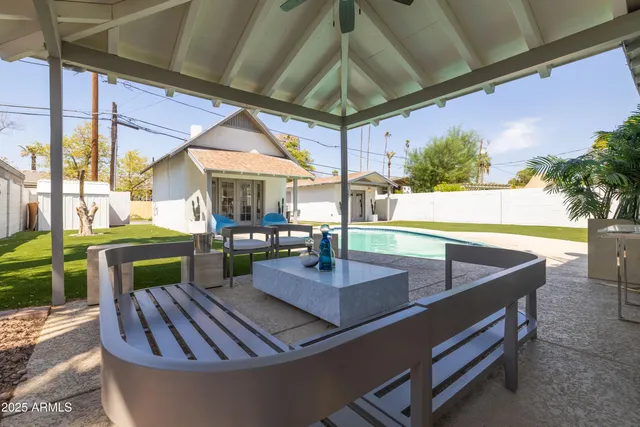 a kitchen with a sink cabinets and a window