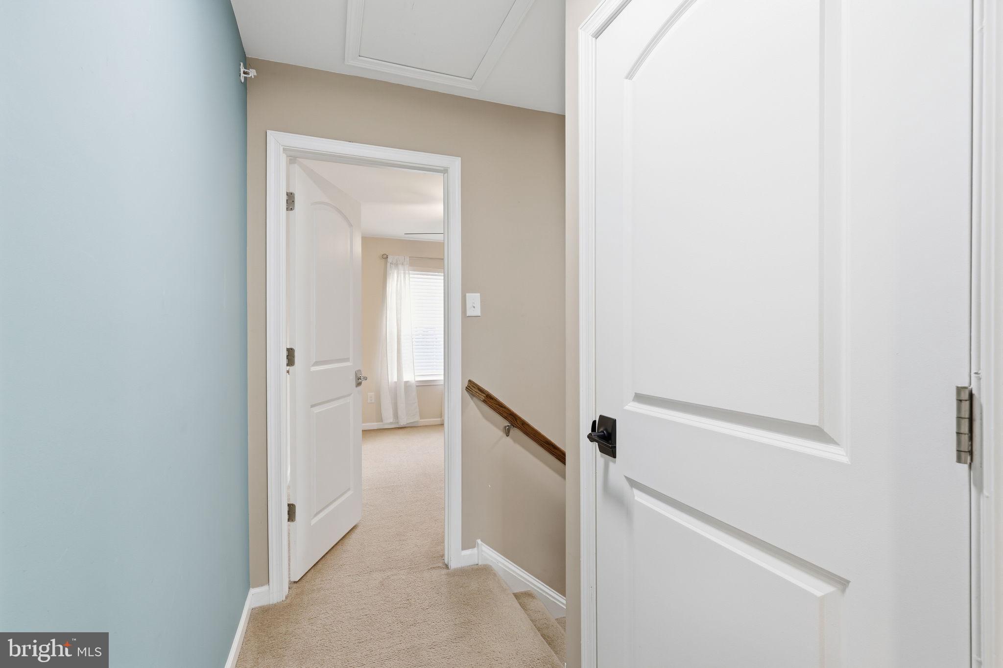 3832 William Daves Road, Unit 3 Doylestown, PA 18902 - Photo 22 of 35 a view of a hallway with a white walls