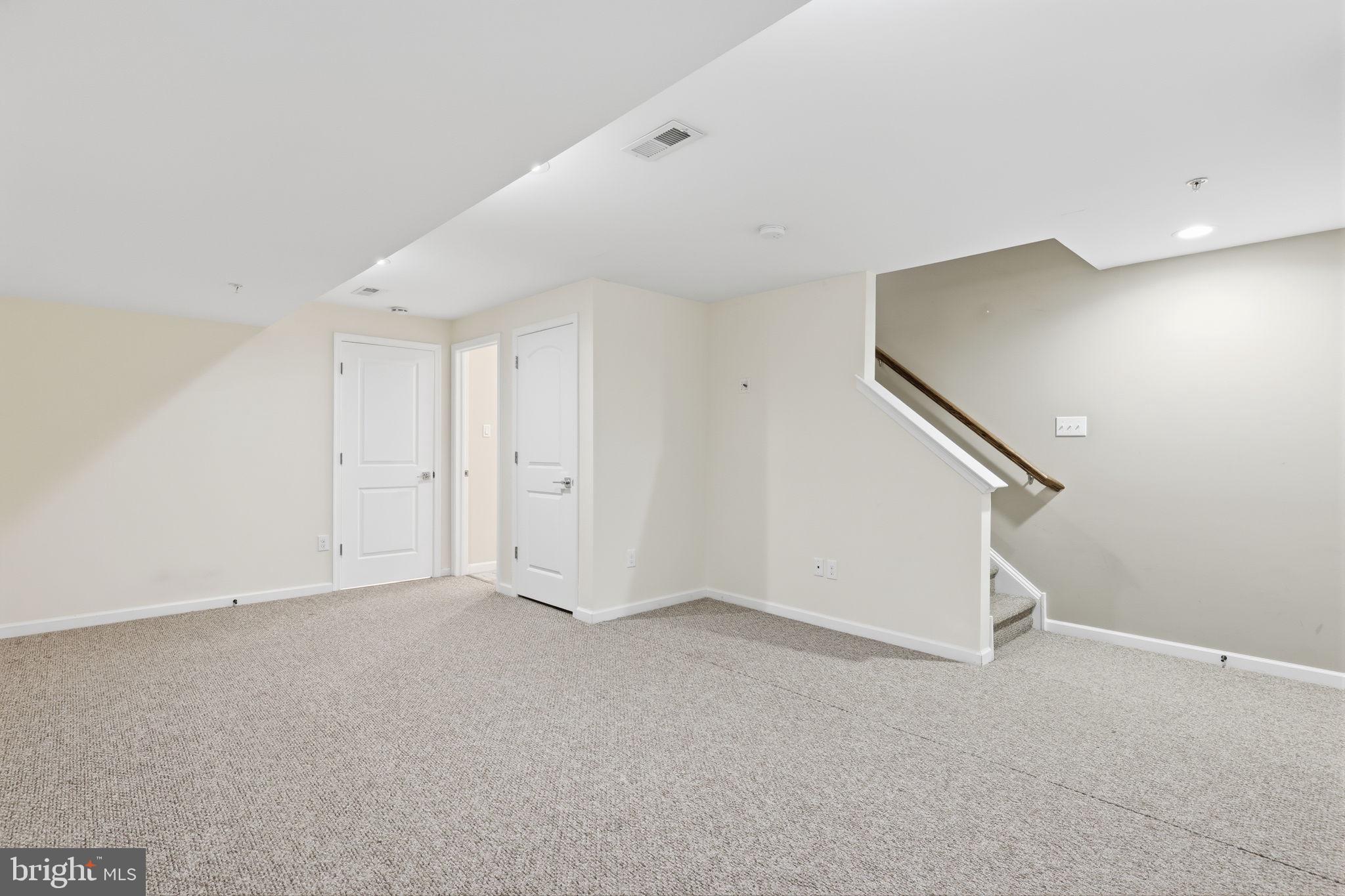 3832 William Daves Road, Unit 3 Doylestown, PA 18902 - Photo 23 of 35 a view of an empty room with stairs