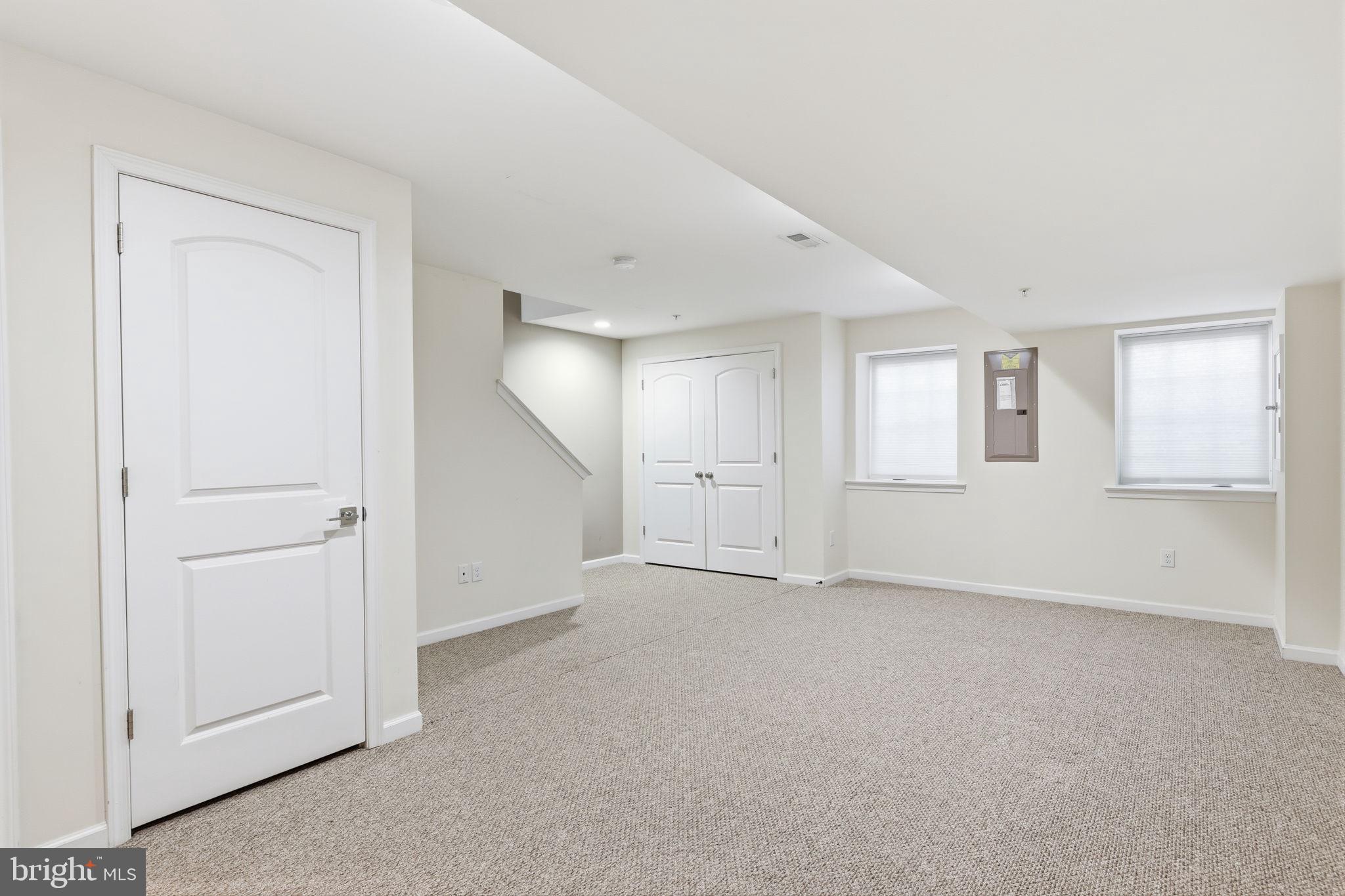 3832 William Daves Road, Unit 3 Doylestown, PA 18902 - Photo 24 of 35 an empty room with windows and closet