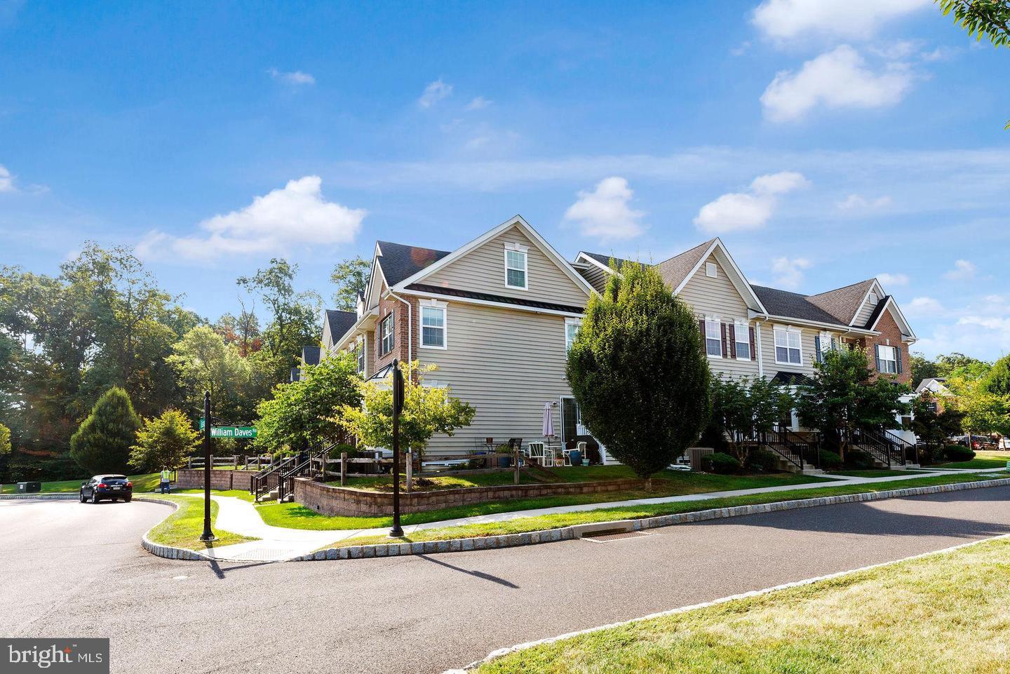 3832 William Daves Road, Unit 3 Doylestown, PA 18902 - Photo 31 of 35 a view of a house with a yard and large tree