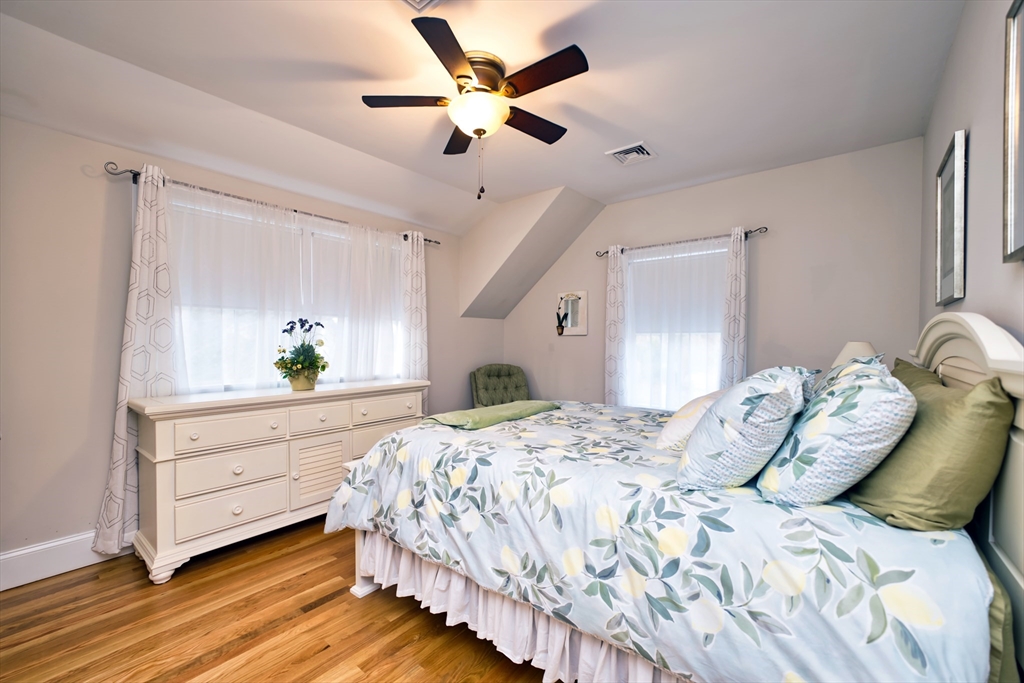 8 Hathaway Pond Circle, Unit 8 Rochester, MA 02770 - Photo 17 of 24 a bed room with a bed and a window