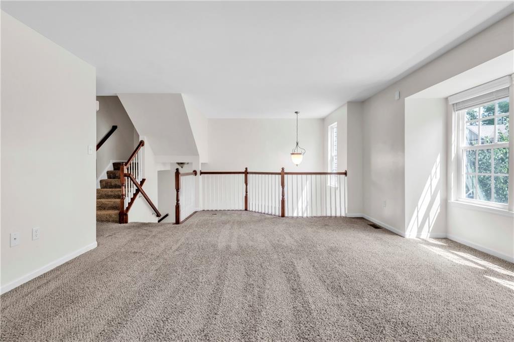 305 Broadstone Drive Mars, PA 16046 - Photo 8 of 31 a view of an empty room with windows