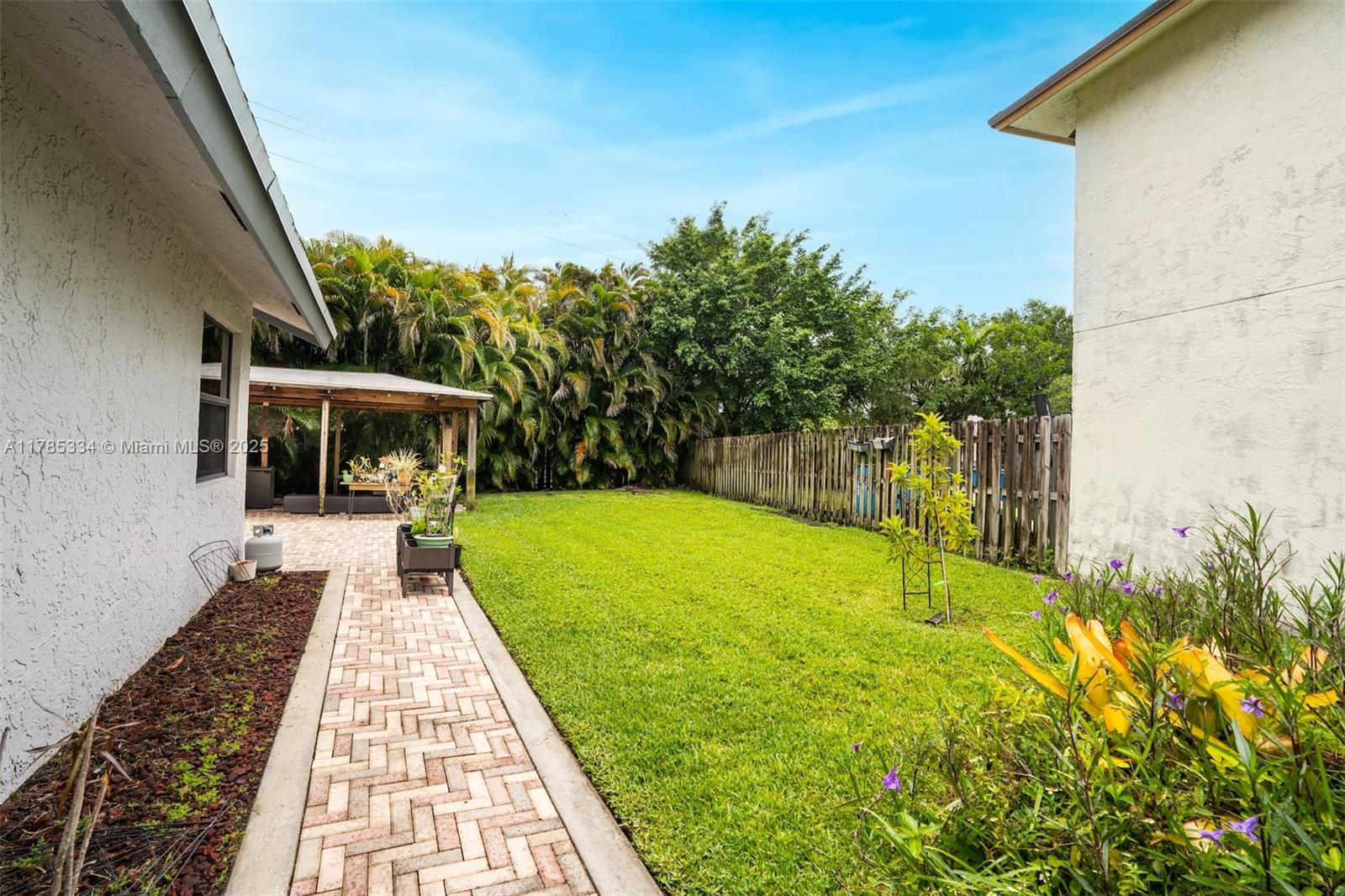 563 Lakeside Circle Sunrise, FL 33326 - Photo 29 of 36 a view of swimming pool with a patio