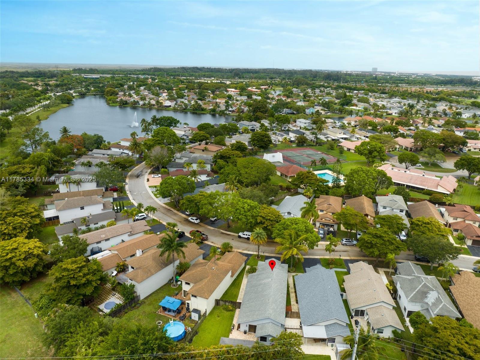 563 Lakeside Circle Sunrise, FL 33326 - Photo 33 of 36 an aerial view of multiple house