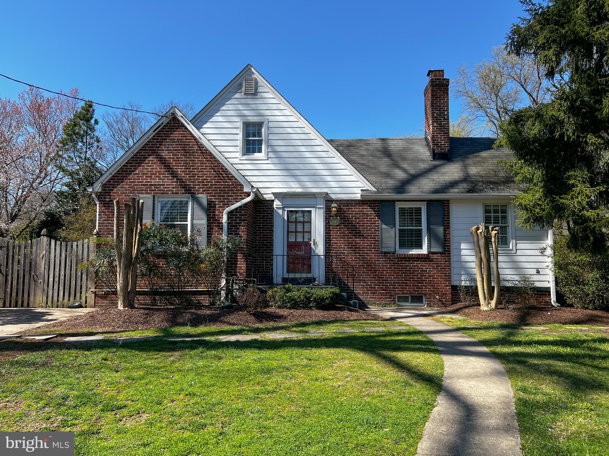 314 Hillmoor Drive Silver Spring, MD 20901 - Photo 1 of 24 a front view of a house with garden