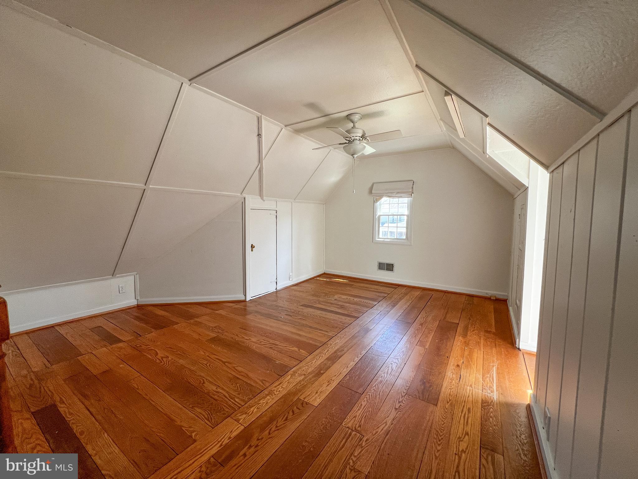 314 Hillmoor Drive Silver Spring, MD 20901 - Photo 15 of 24 a view of empty room with wooden floor and fan