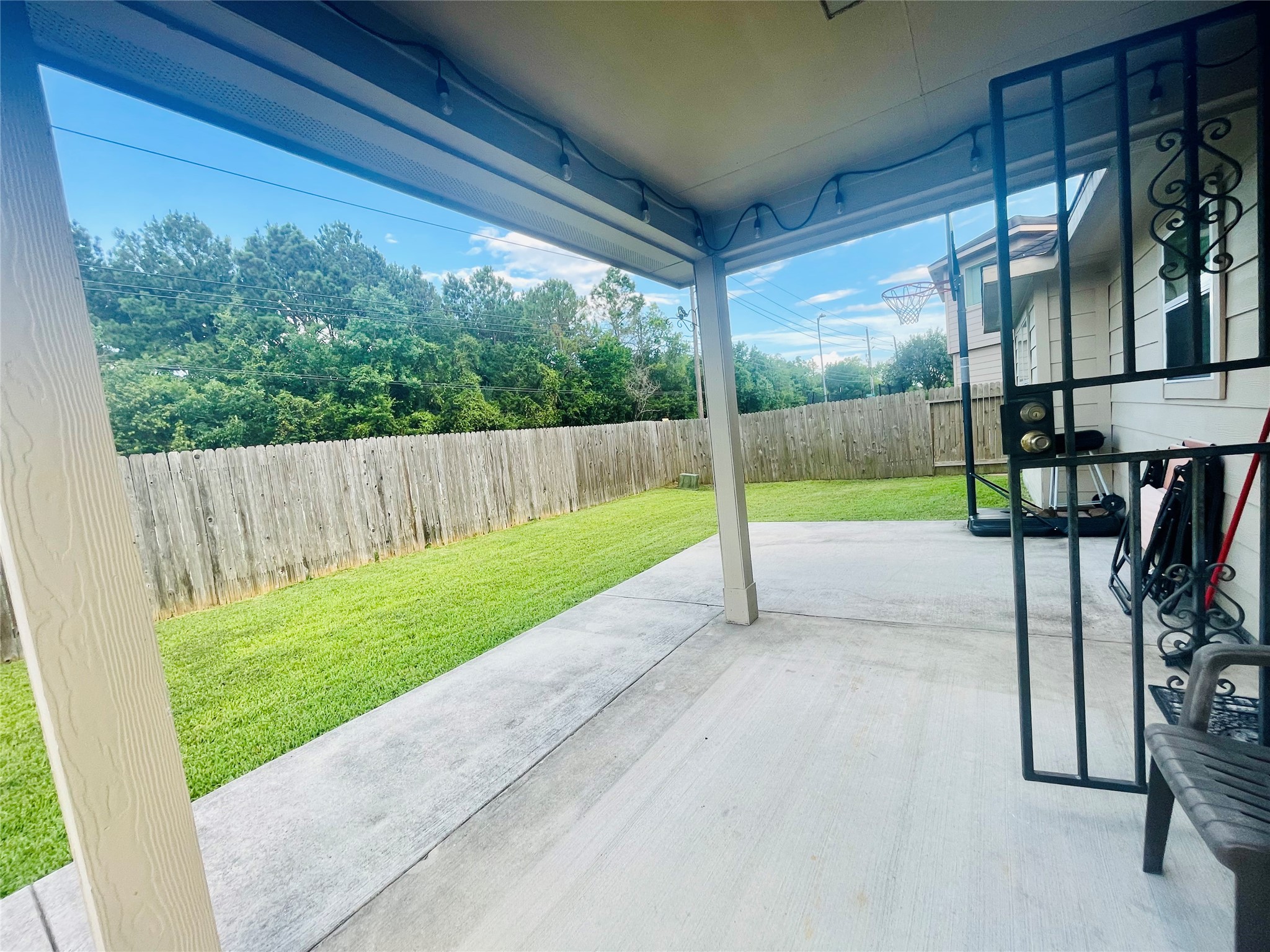 722 Pequin Road Crosby, TX 77532 - Photo 10 of 12 a view of a porch with a backyard