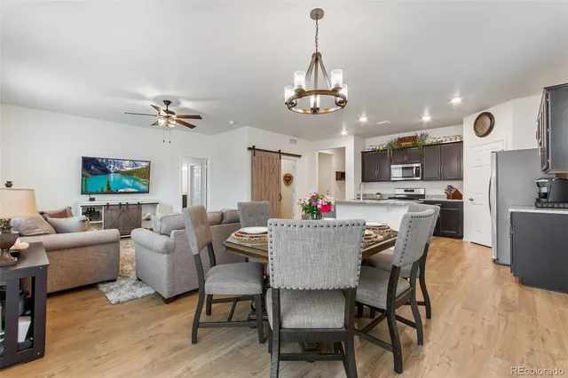 a view of a dining room with furniture